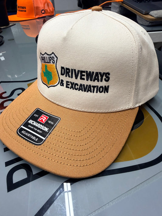 Special Edition Phillips Driveways Hat | cream top with a bold Texas gold bill